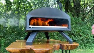 Bertello Outdoor Pizza Oven  Using Wood and Charcoal [upl. by Kare]