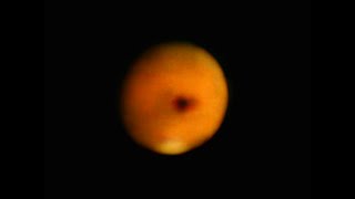 What is this dark object passing in front of Mars [upl. by Av]