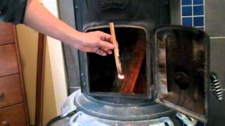 How to build a fire in a potbelly woodstove [upl. by Arreik252]