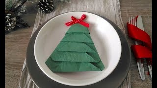 Come piegare un tovagliolo a forma di albero di Natale how to fold a napkin like a Christmas tree [upl. by Gora385]