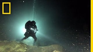 Diving in a Sacred Maya Cave  National Geographic [upl. by Anicul]