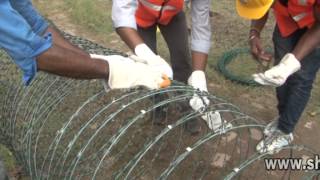 Razor Wire Installation Tutorial Video [upl. by Atillertse387]