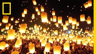 Watch as Lanterns Fill the Sky in Thailand  National Geographic [upl. by Nyloc]