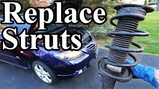 How to Replace Struts in your Car or Truck [upl. by Yrocal42]