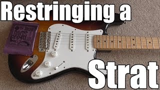 How to Restring a Stratocaster [upl. by Acirtap]