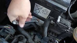 How to change the car battery in a Vauxhall Corsa  Opel [upl. by Edita967]