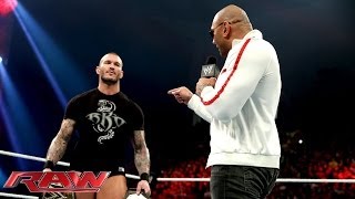 Batista returns and declares hes after Randy Ortons WWE World Heavyweight Title Raw Jan 20 201 [upl. by Hgielyak210]