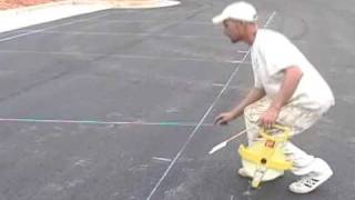 How to use the Magnum Chalk Line to snap chalklines on pavement [upl. by Llertac]